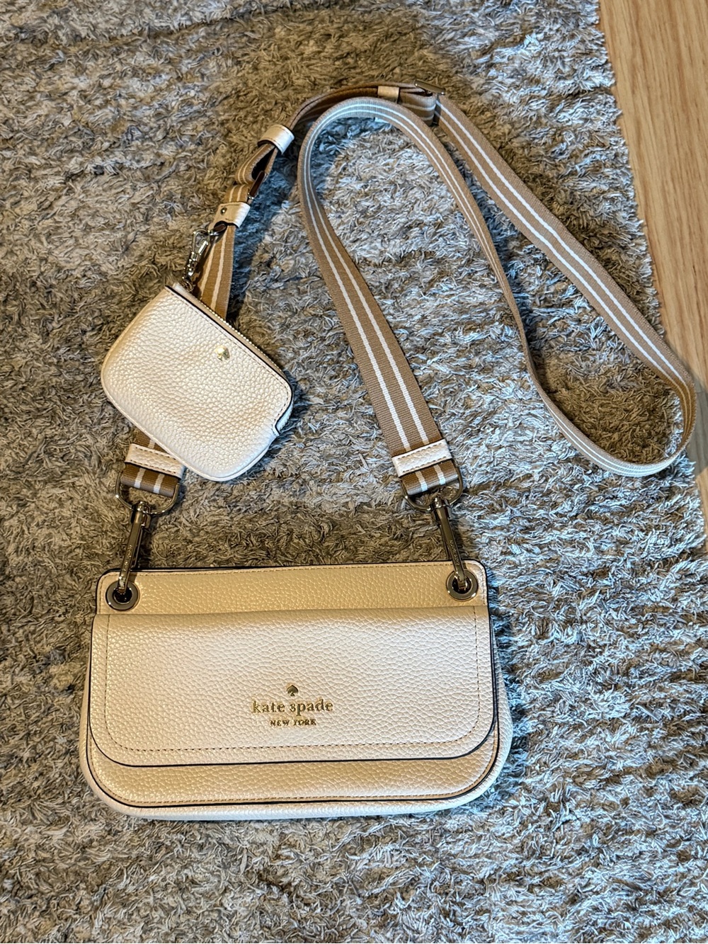 kate spade New York Cream Pebbled Leather Crossbody with Striped Strap
